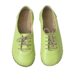 women barefoot green shoes