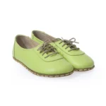 women barefoot green shoes